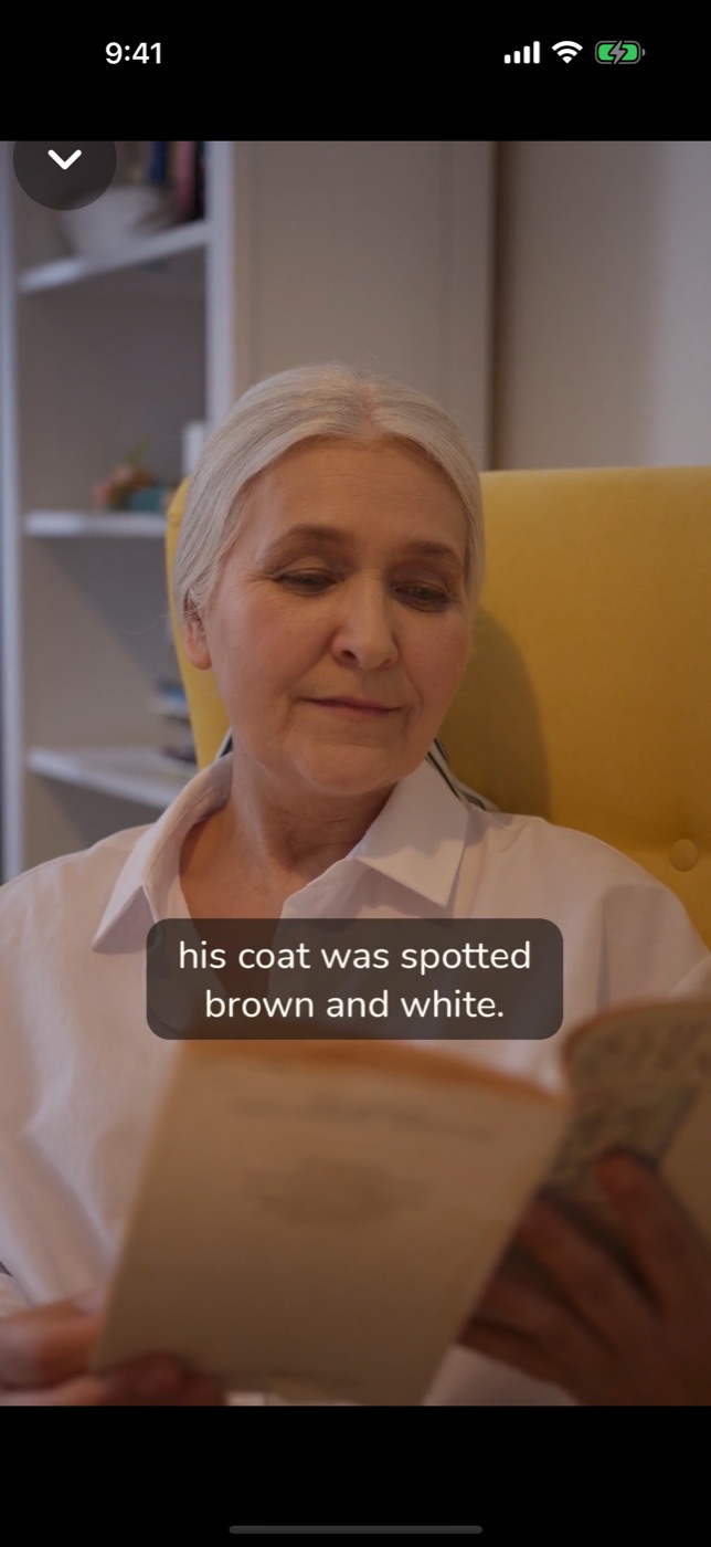 Grandma reading a story in the Sleepy Moon video player with captions on screen